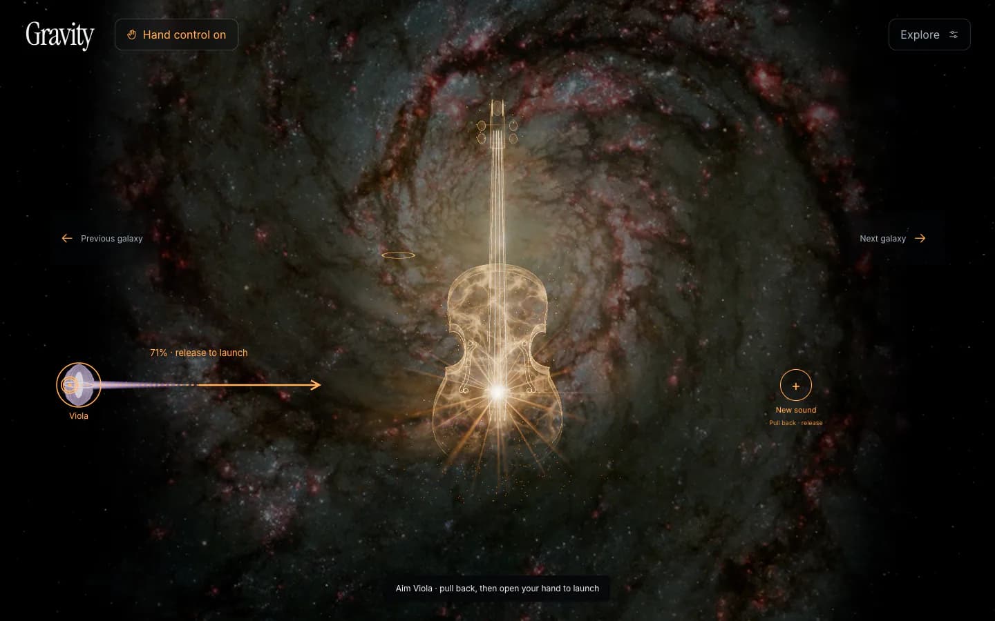 Gravity's hand-control interface showing a visitor pulling back a Viola spring before launching it into Celestial space.