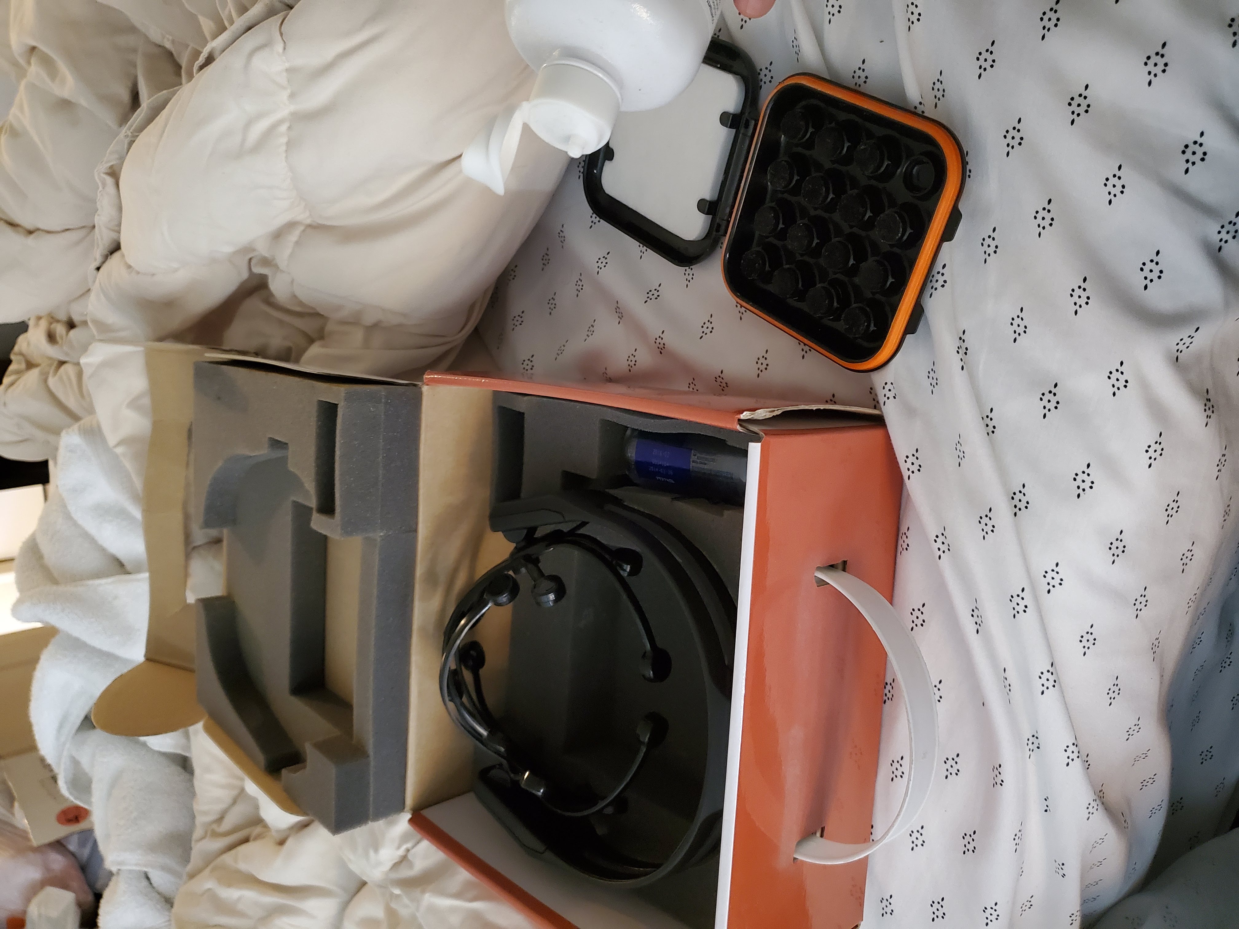 The Emotiv EPOC+ device and kit used in the project.